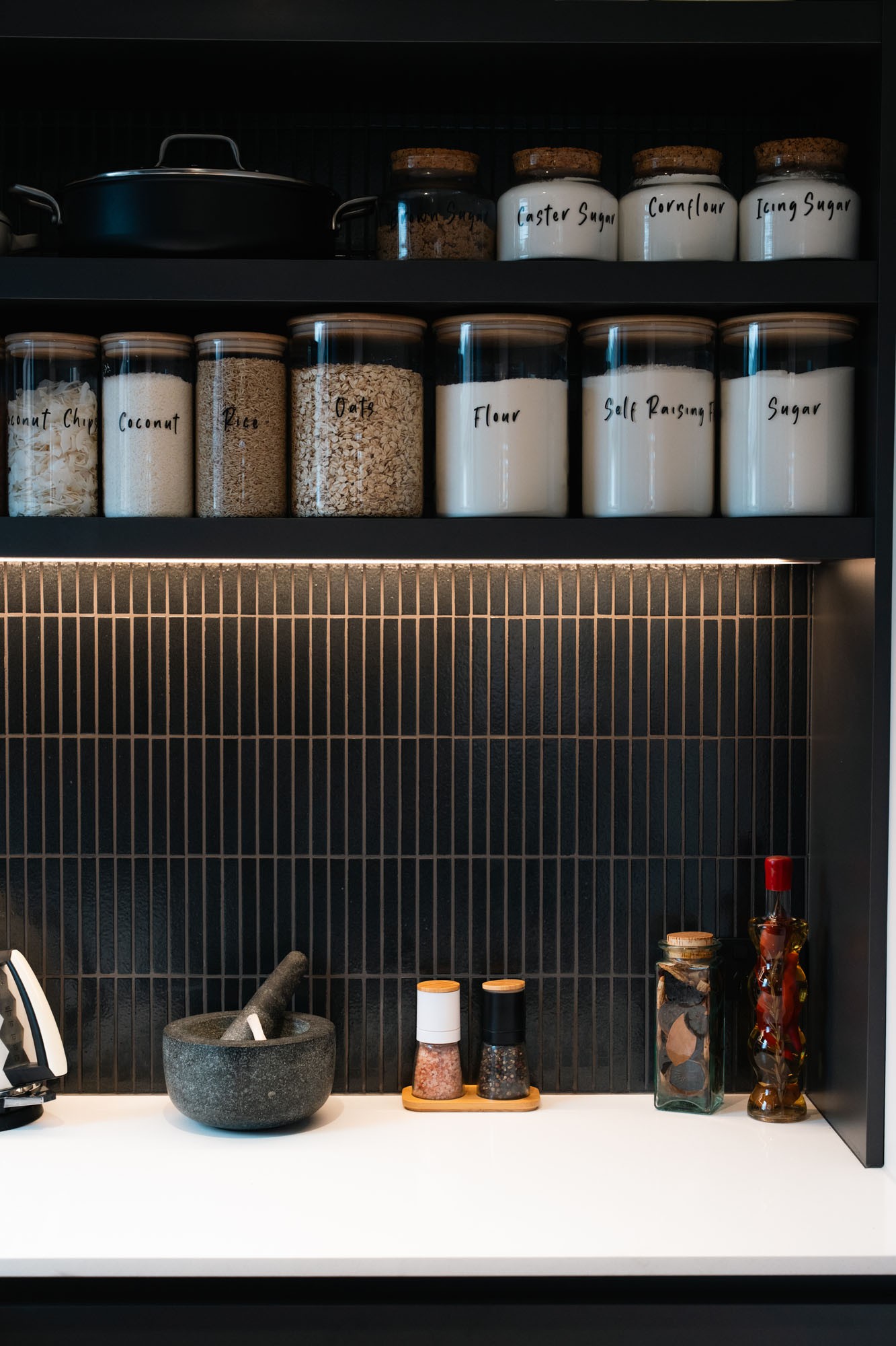 Graphic depicting a hexagonal cropped photo of an interior room design with grid lines along its borders.