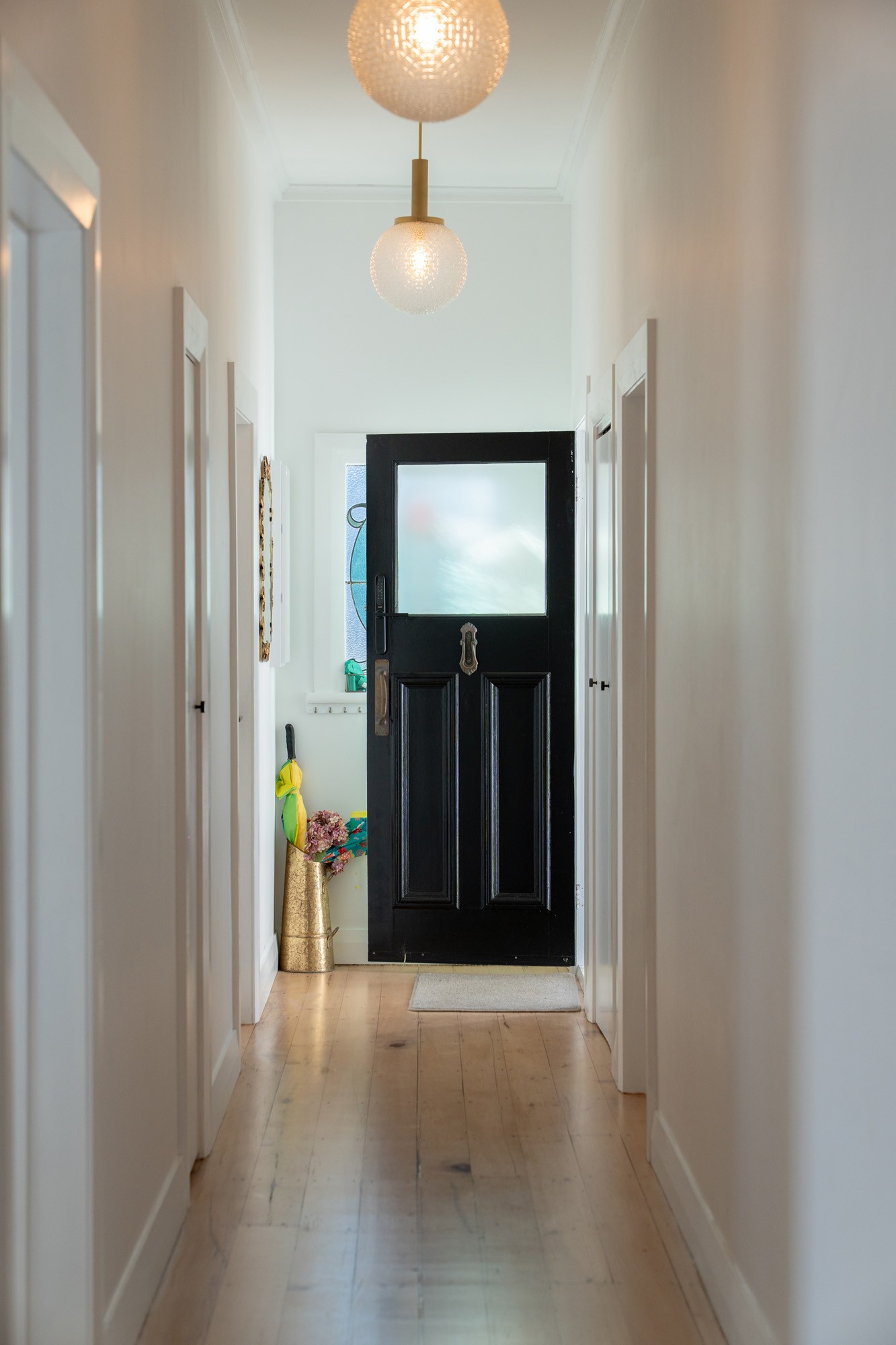 Graphic depicting a hexagonal cropped photo of an interior room design with grid lines along its borders.